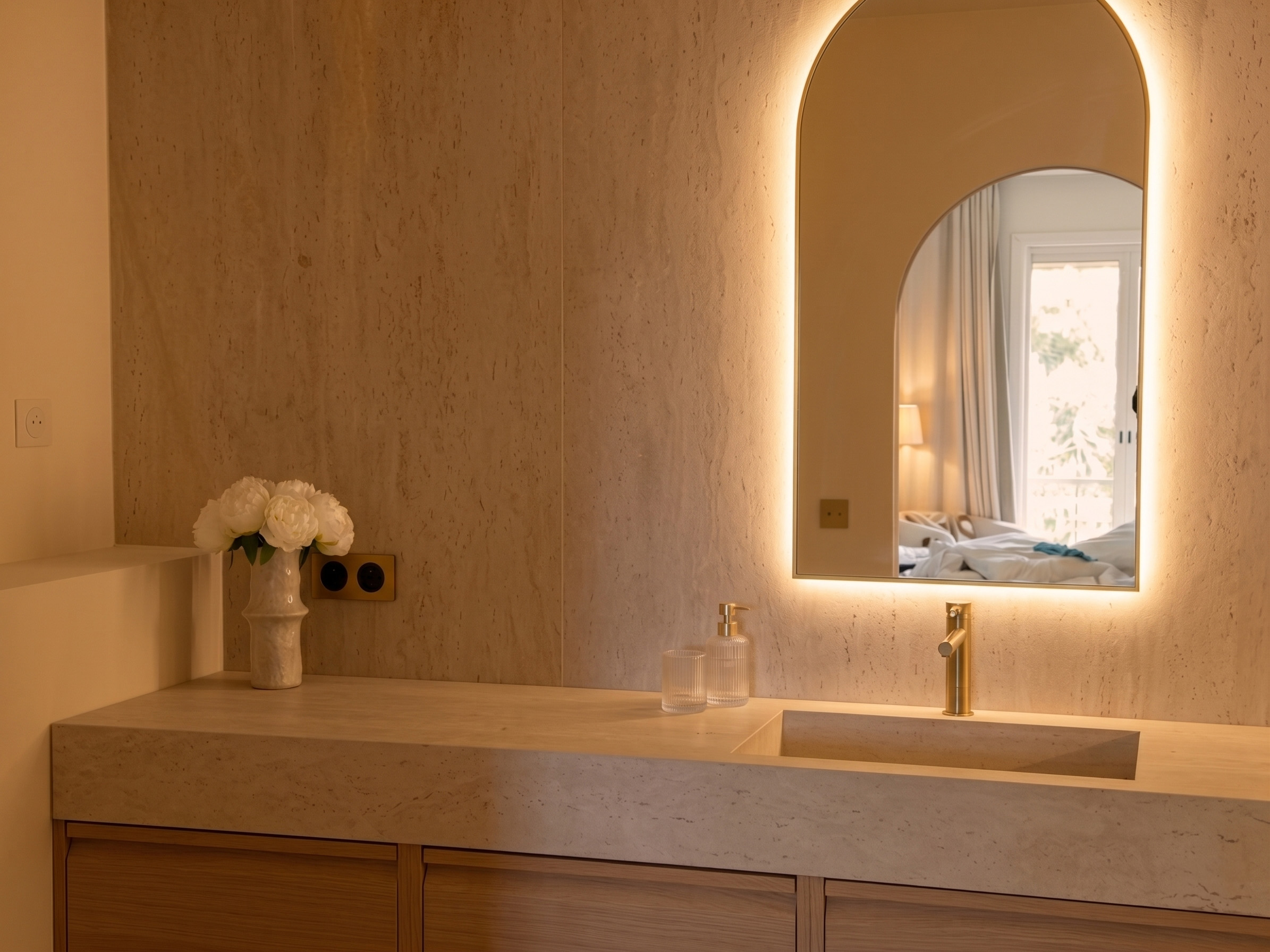 Bathroom vanity with brass taps and integrated storage